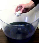 Crumpled paper in cup, step 1